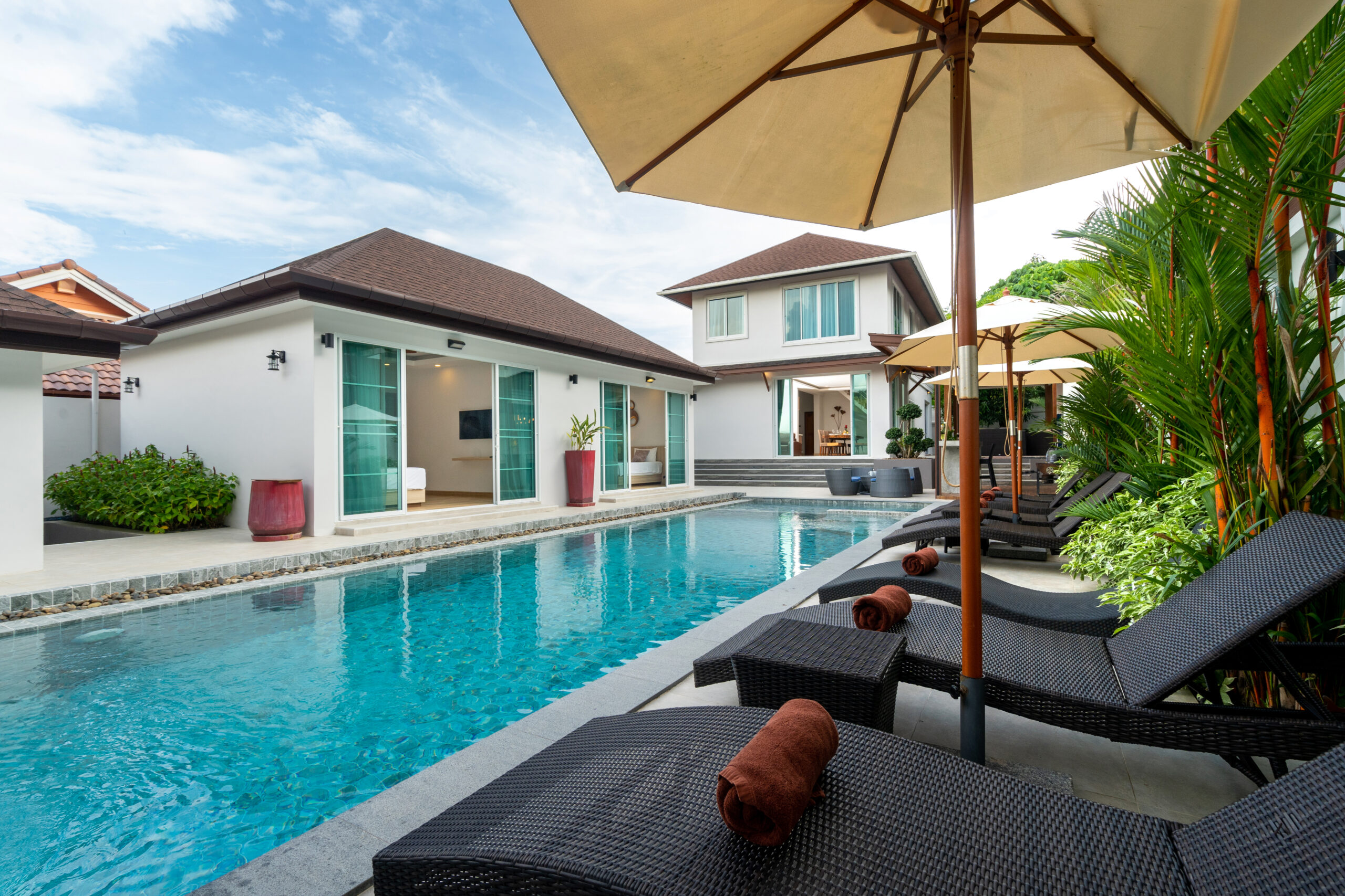 Outdoor swimming pool with counter bar in pool terrace